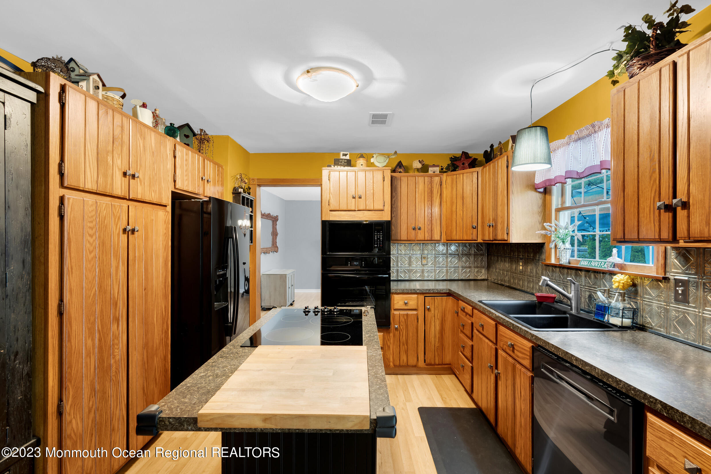 1216 Andover Road Brick, NJ 08724 - Photo 17 of 50 a kitchen with stainless steel appliances granite countertop a refrigerator a stove and a sink