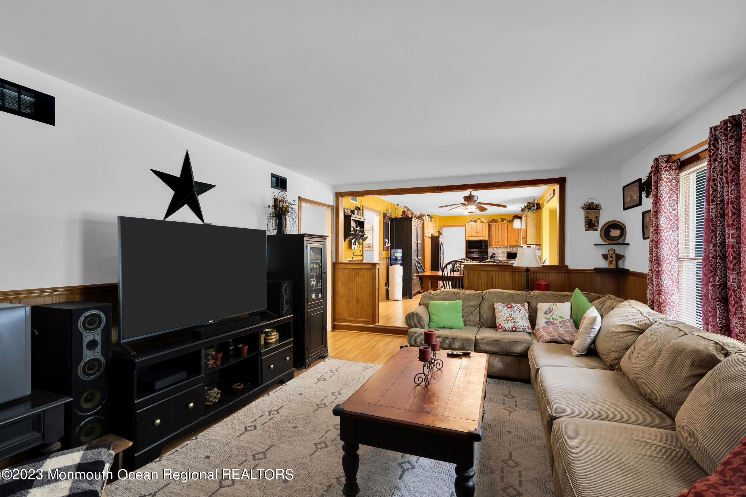 1216 Andover Road Brick, NJ 08724 - Photo 21 of 50 a living room with furniture and a flat screen tv