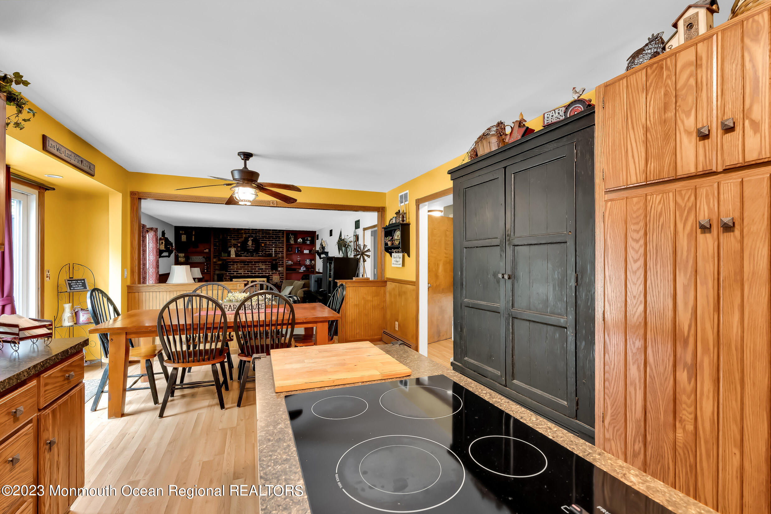1216 Andover Road Brick, NJ 08724 - Photo 22 of 50 a dining room filled with furniture and chandelier