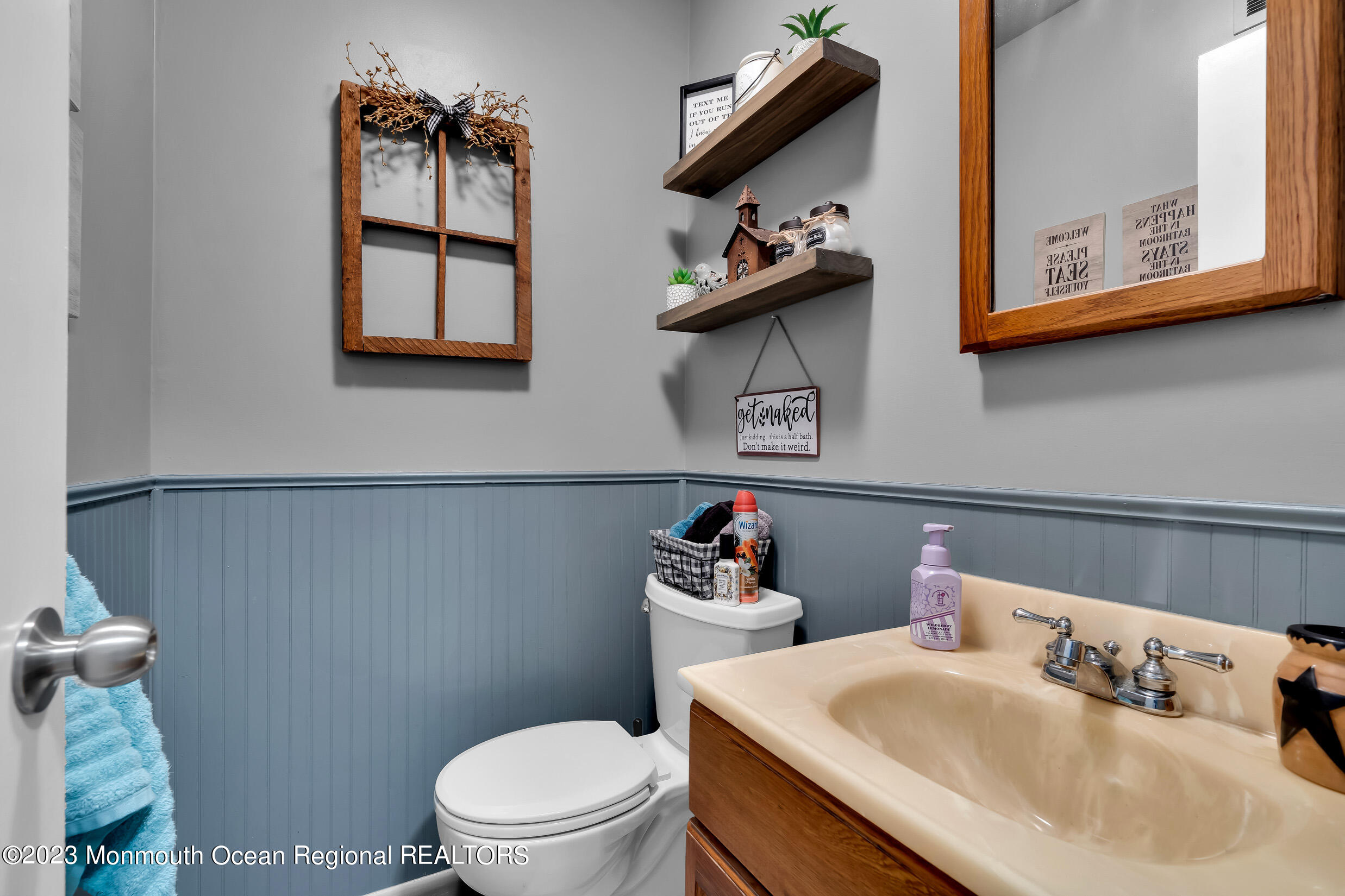 1216 Andover Road Brick, NJ 08724 - Photo 37 of 50 a bathroom with a sink mirror and toilet