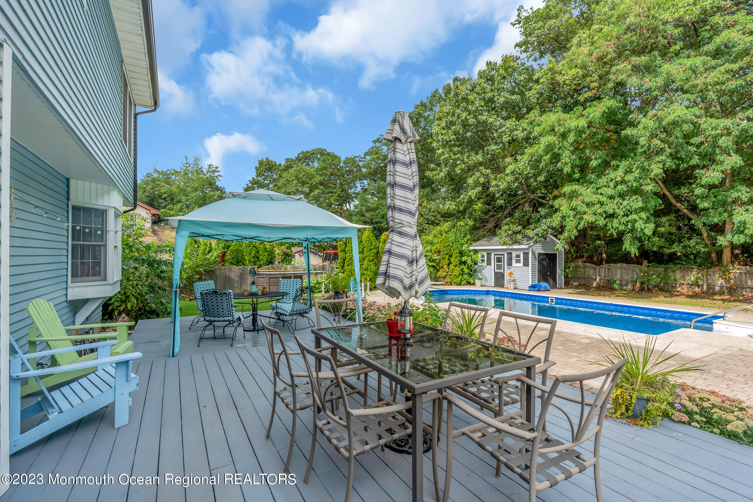 1216 Andover Road Brick, NJ 08724 - Photo 42 of 50 a view of balcony with outdoor seating and wooden floor