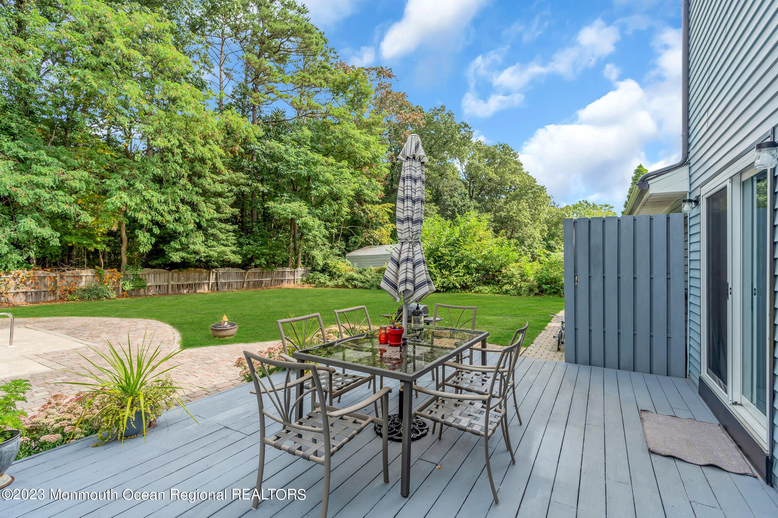 1216 Andover Road Brick, NJ 08724 - Photo 43 of 50 a view of a table and chairs in patio of the house