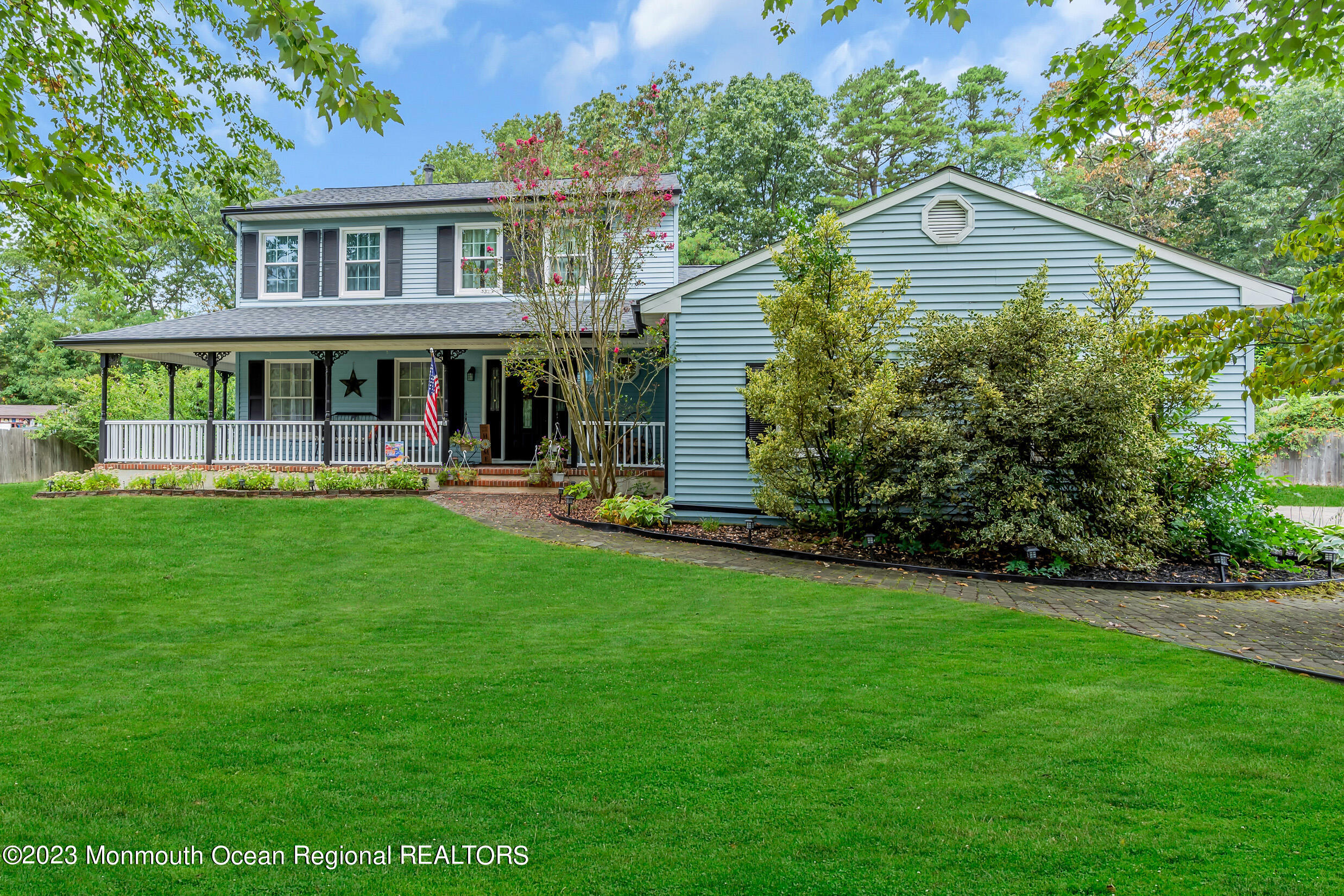 1216 Andover Road Brick, NJ 08724 - Photo 8 of 50 a front view of a house with a yard