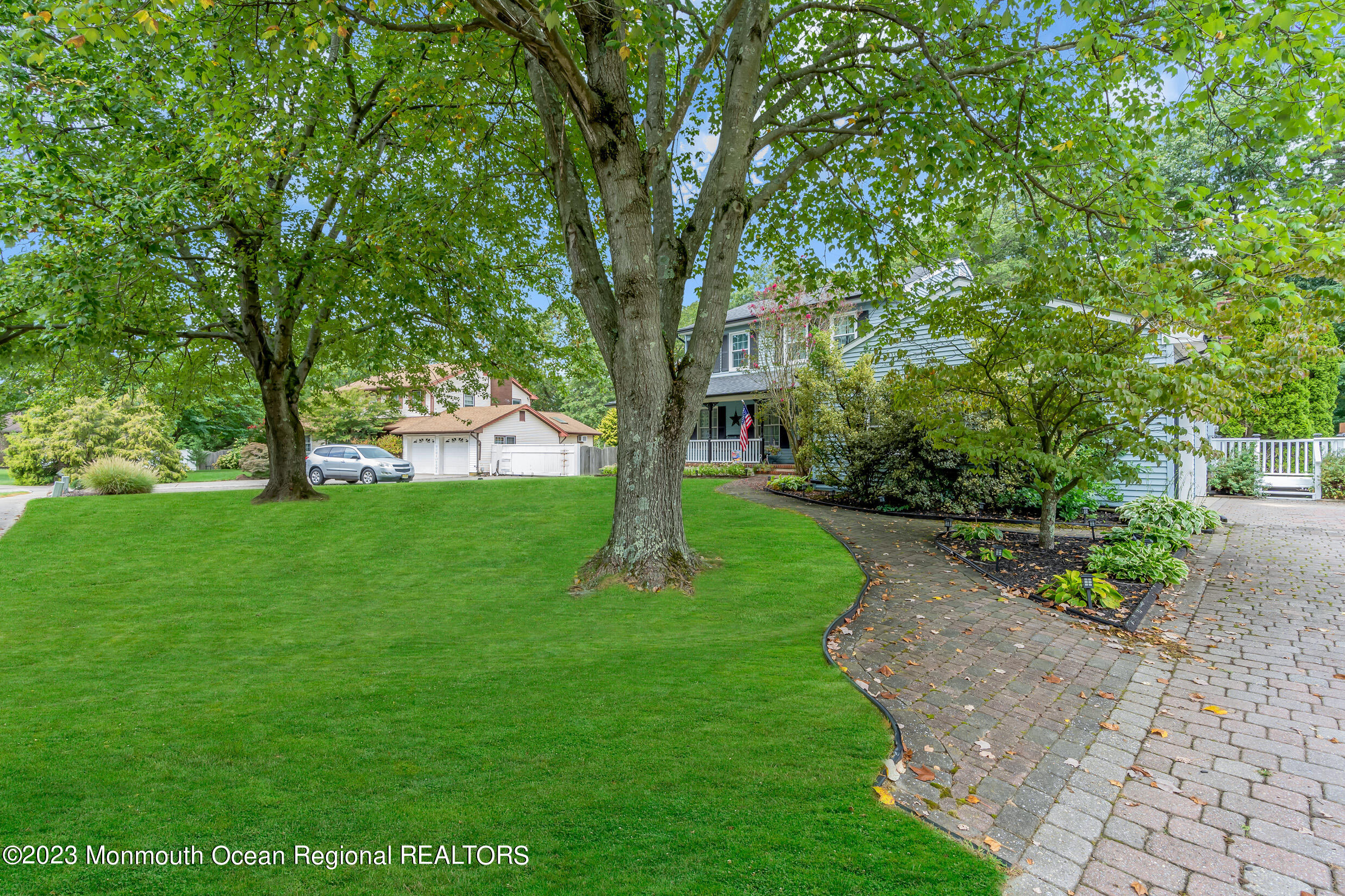 1216 Andover Road Brick, NJ 08724 - Photo 9 of 50 a view of a yard with a large trees