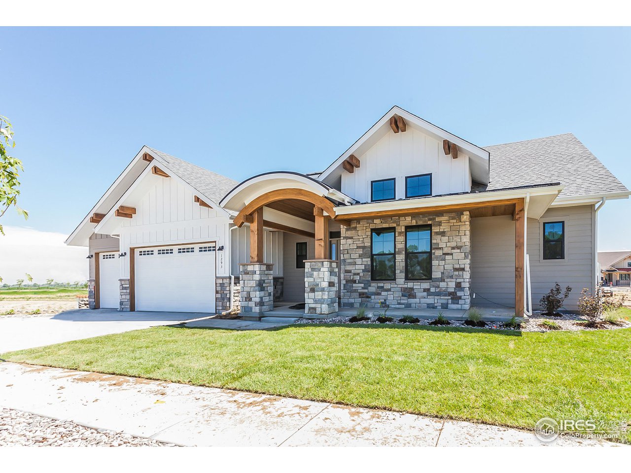 1293 Burt Avenue Berthoud, CO 80513 - Photo 2 of 40 a front view of house with yard