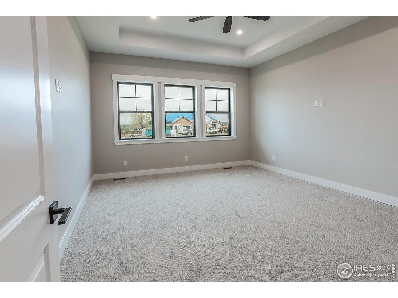1293 Burt Avenue Berthoud, CO 80513 - Photo 23 of 40 a view of an empty room with a window