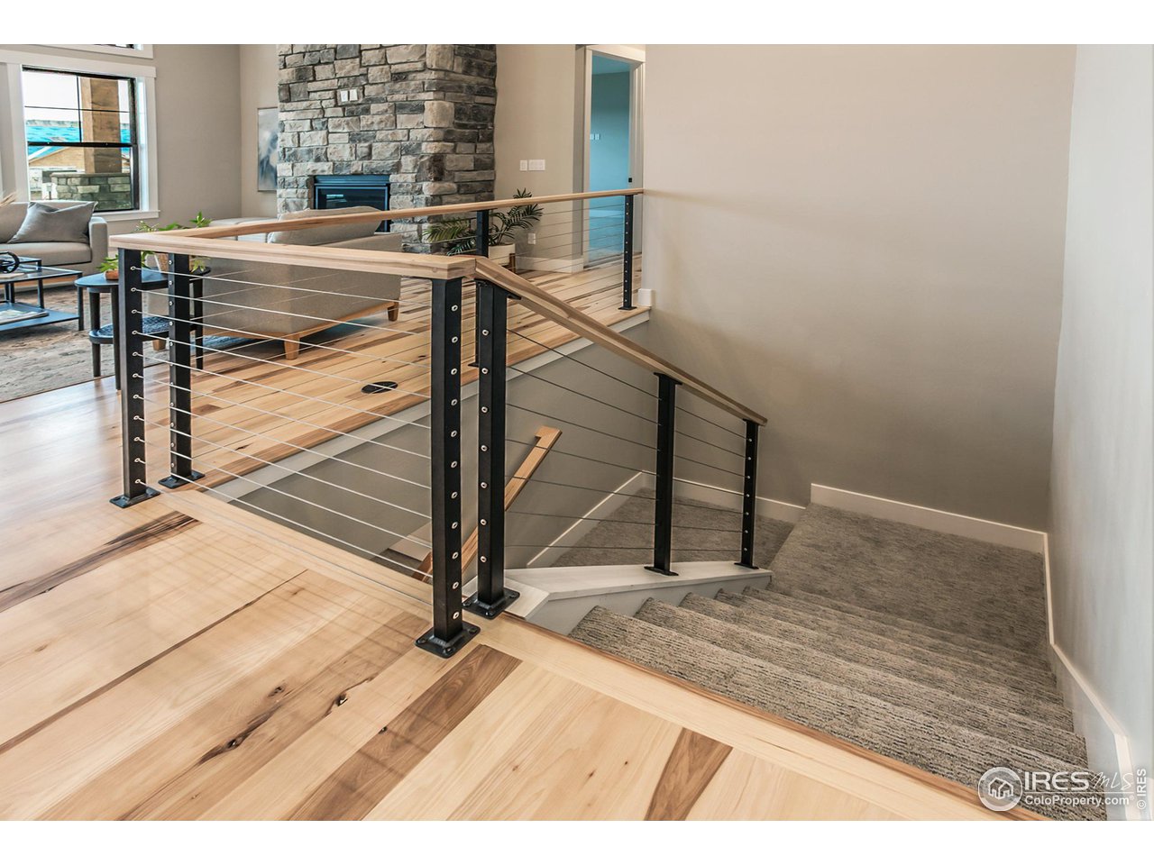 1293 Burt Avenue Berthoud, CO 80513 - Photo 30 of 40 a view of livingroom with furniture and wooden floor