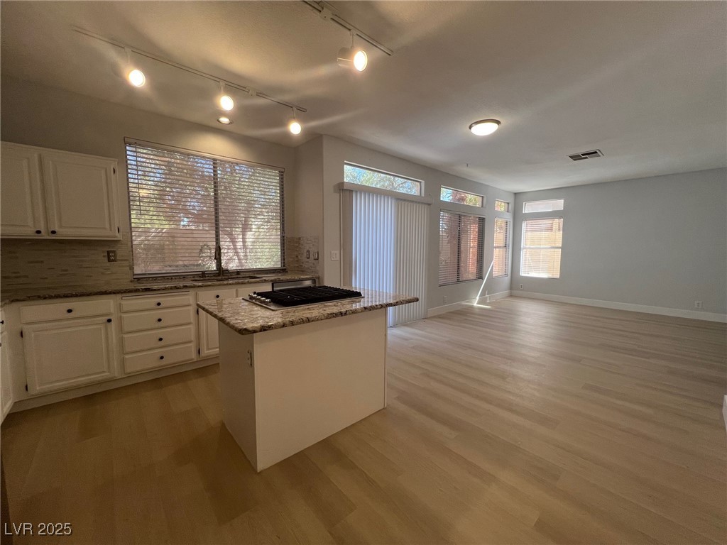 1624 Wandering Winds Way Las Vegas, NV 89128 - Photo 11 of 53 kitchen opens to a nook and Family room