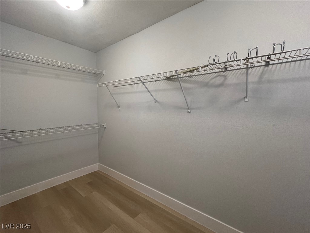 1624 Wandering Winds Way Las Vegas, NV 89128 - Photo 35 of 53 Master bedroom, walk in closet