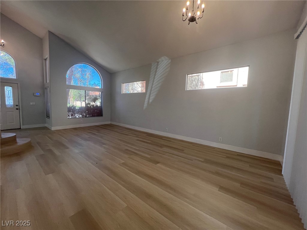 1624 Wandering Winds Way Las Vegas, NV 89128 - Photo 5 of 53 Custom windows. Living room/dining room.