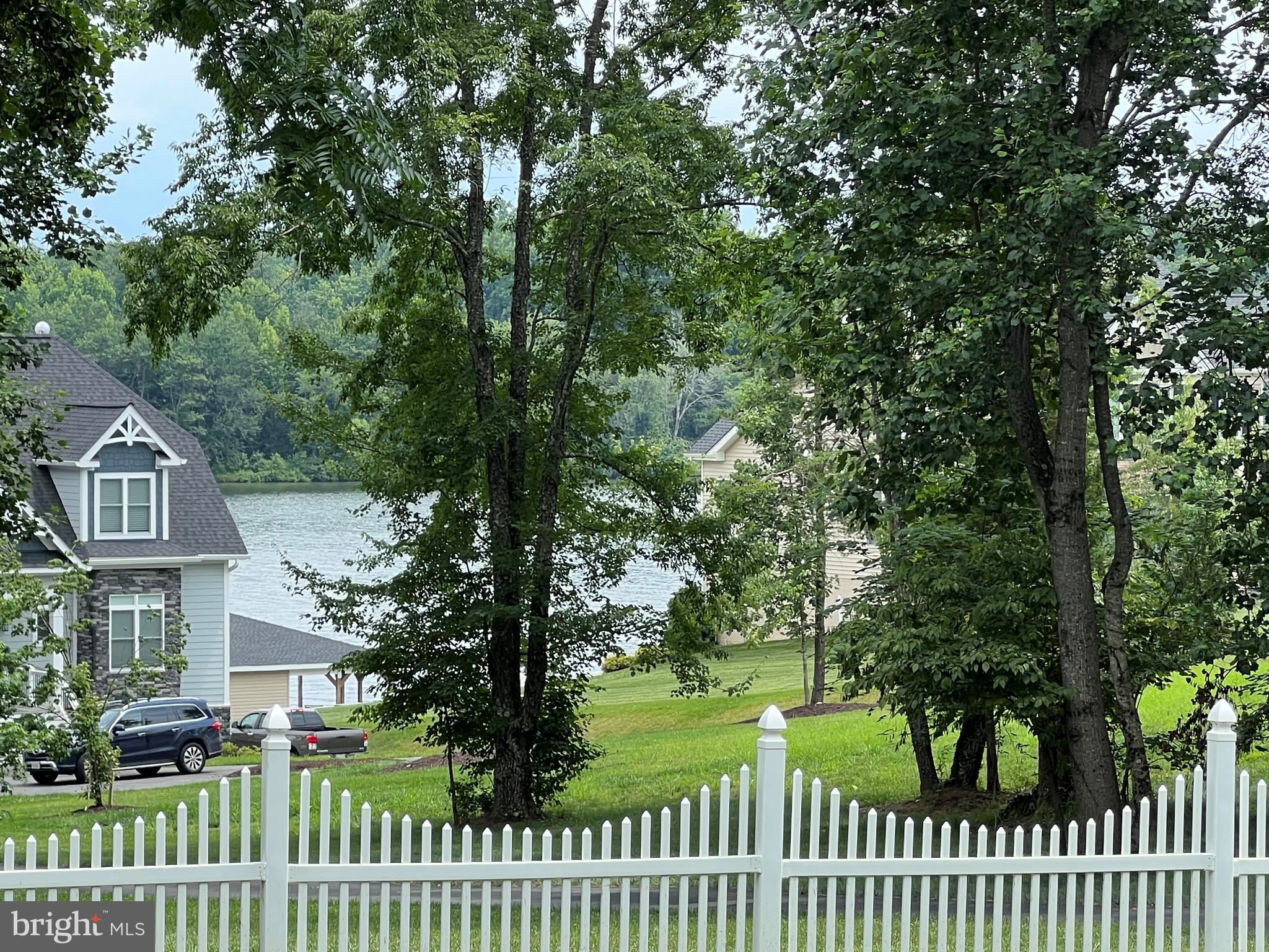 Highlander Path Mineral, VA 23117 - Photo 2 of 9 a front view of a house with a garden