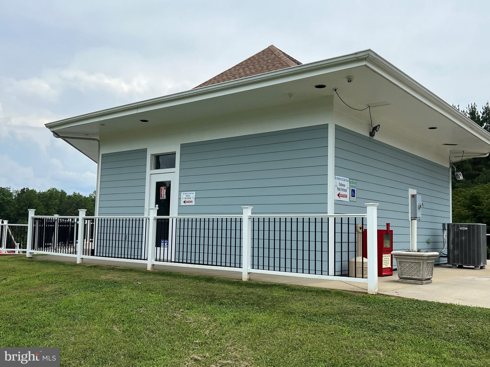 Highlander Path Mineral, VA 23117 - Photo 9 of 9 a front view of a house with a garden and yard