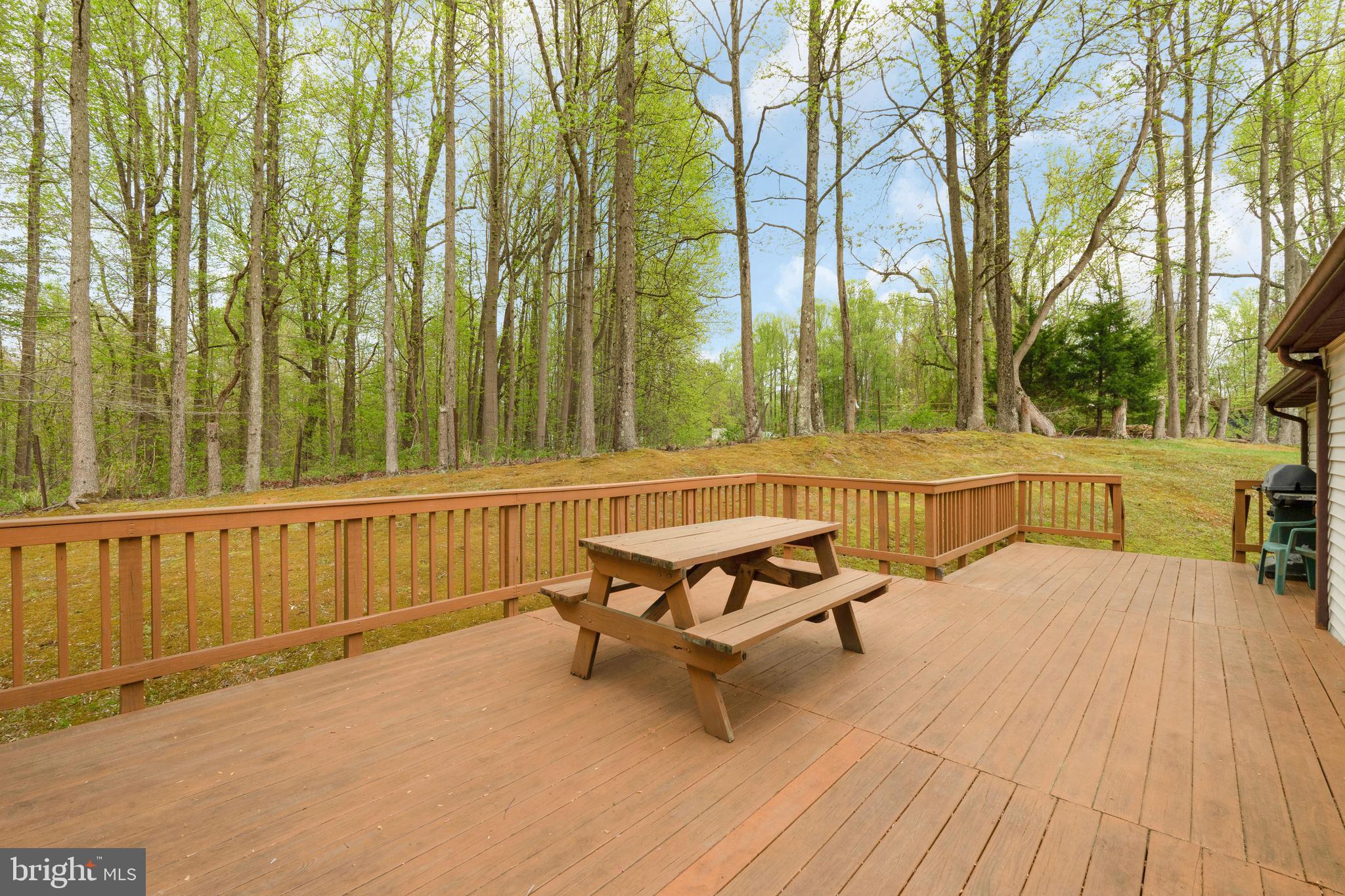 8331 Pushaw Station Road Owings, MD 20736 - Photo 61 of 85 Huge Free Standing Deck on the back of home.