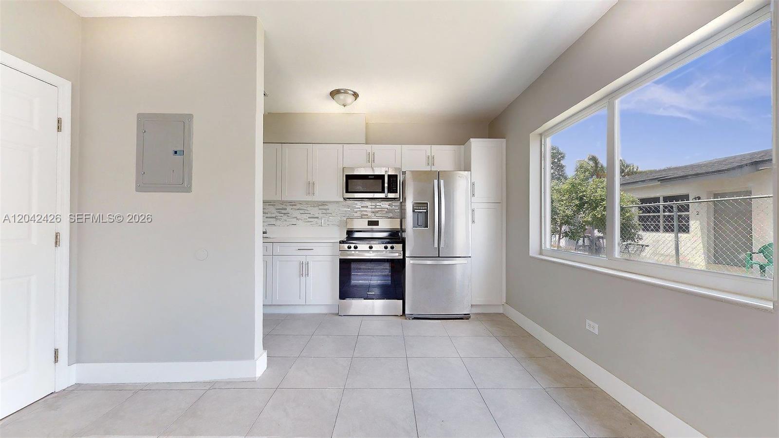 74 West 15th Street, Unit 1 Hialeah, FL 33010 - Photo 5 of 23 Living & Kitchen