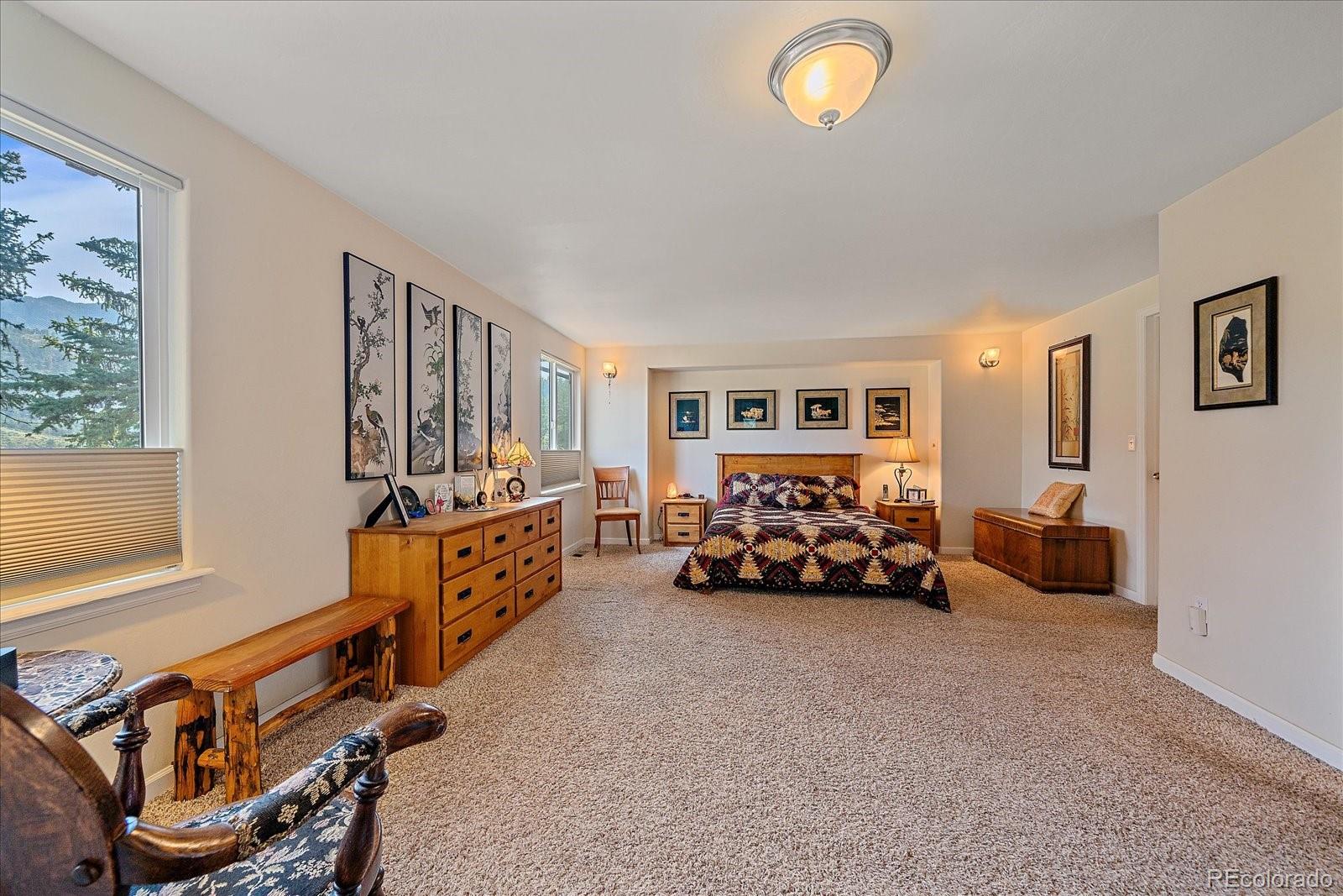 357 County Road 64 Shawnee, CO 80475 - Photo 13 of 50 a bedroom with furniture and a window