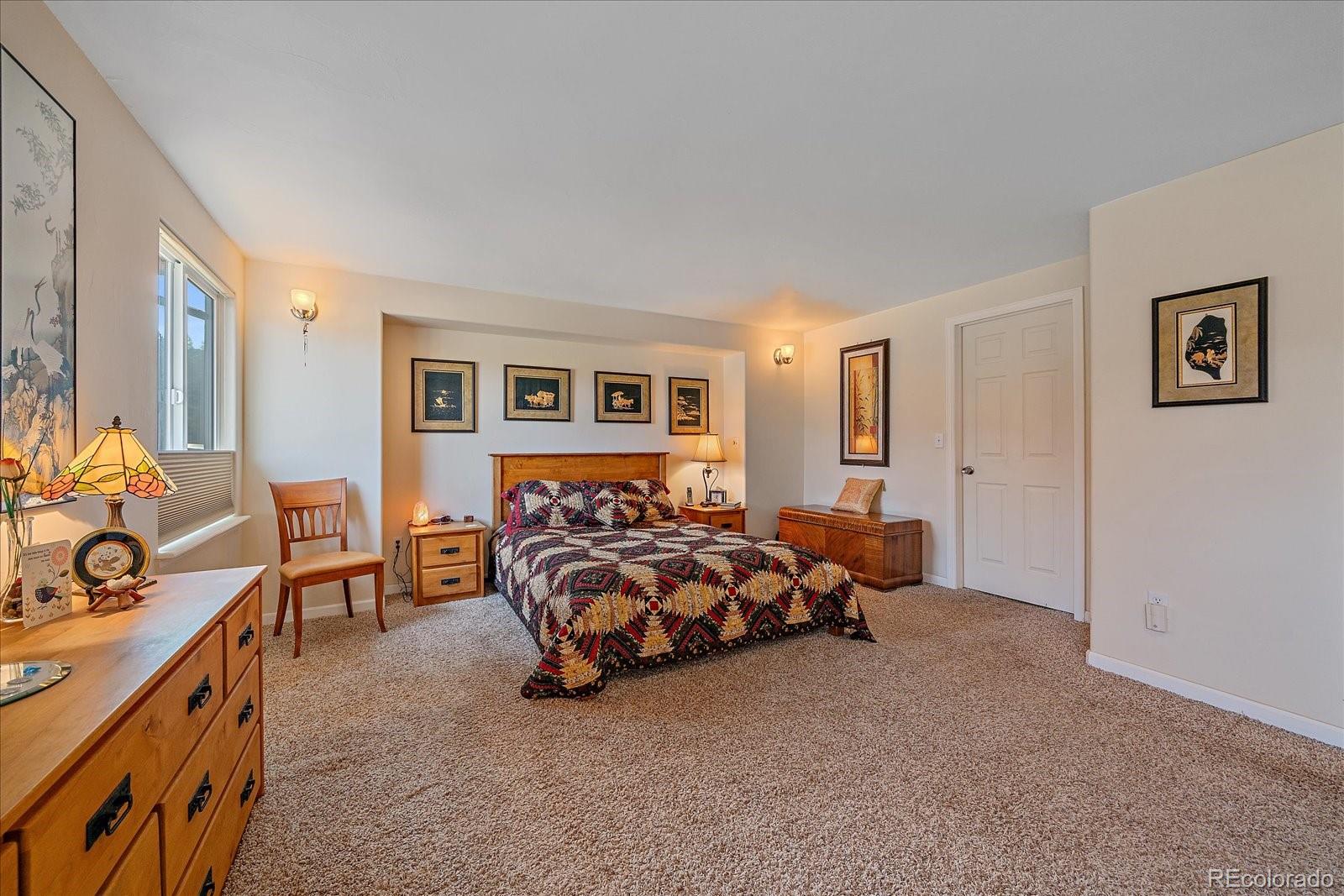 357 County Road 64 Shawnee, CO 80475 - Photo 14 of 50 a bed room with a bed and a couch