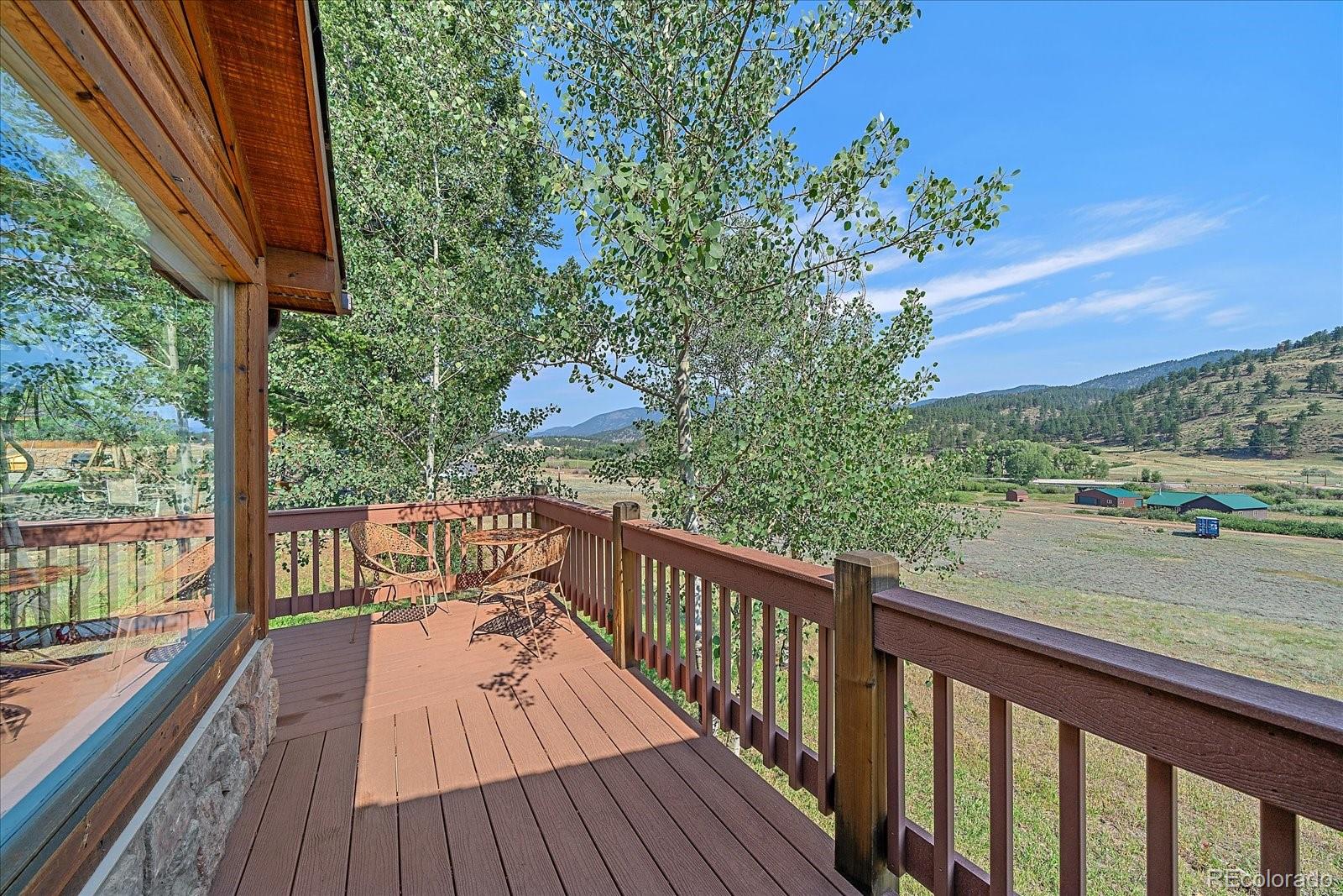 357 County Road 64 Shawnee, CO 80475 - Photo 24 of 50 a view of balcony of a house and wooden floor