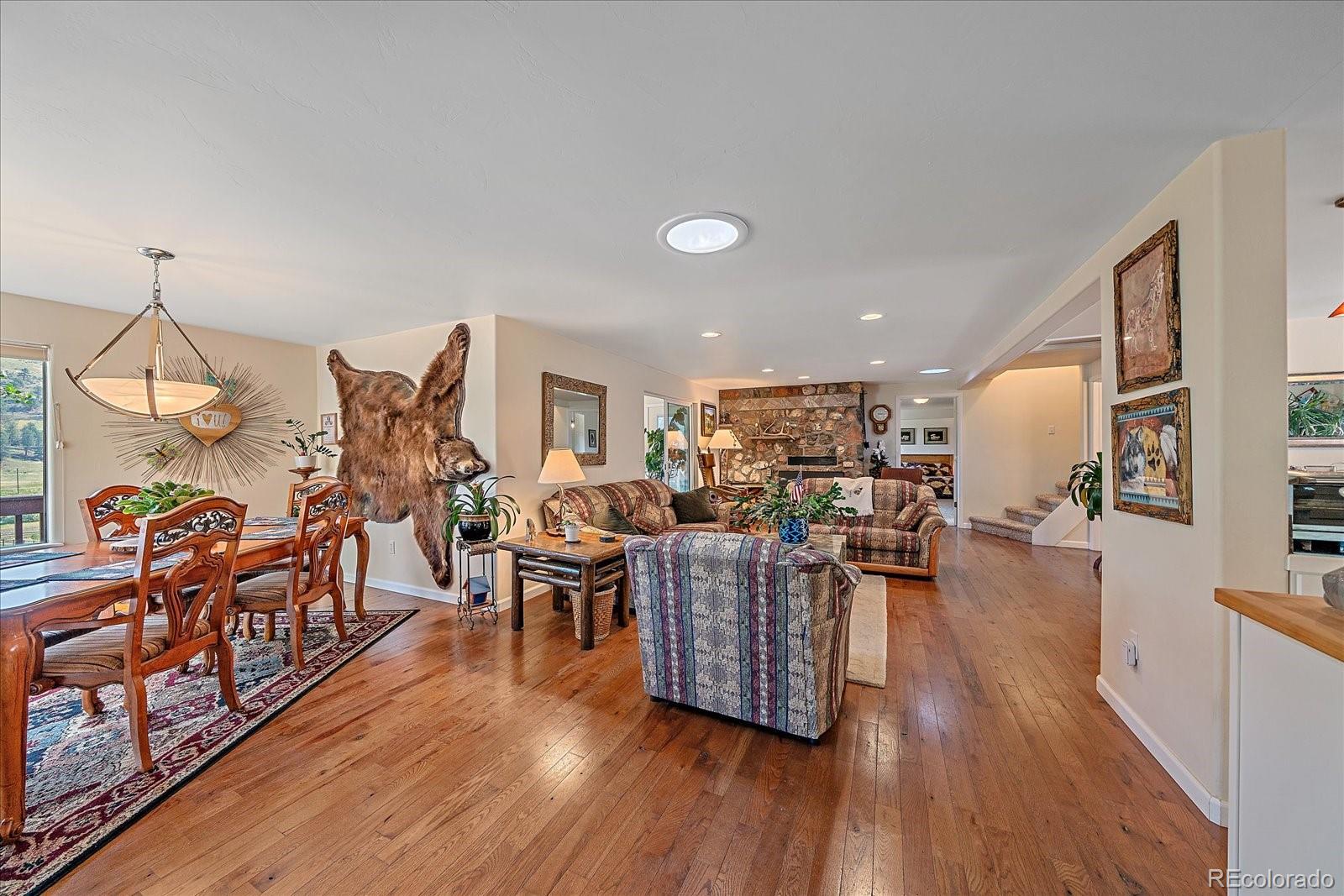 357 County Road 64 Shawnee, CO 80475 - Photo 3 of 50 a living room with furniture and wooden floor