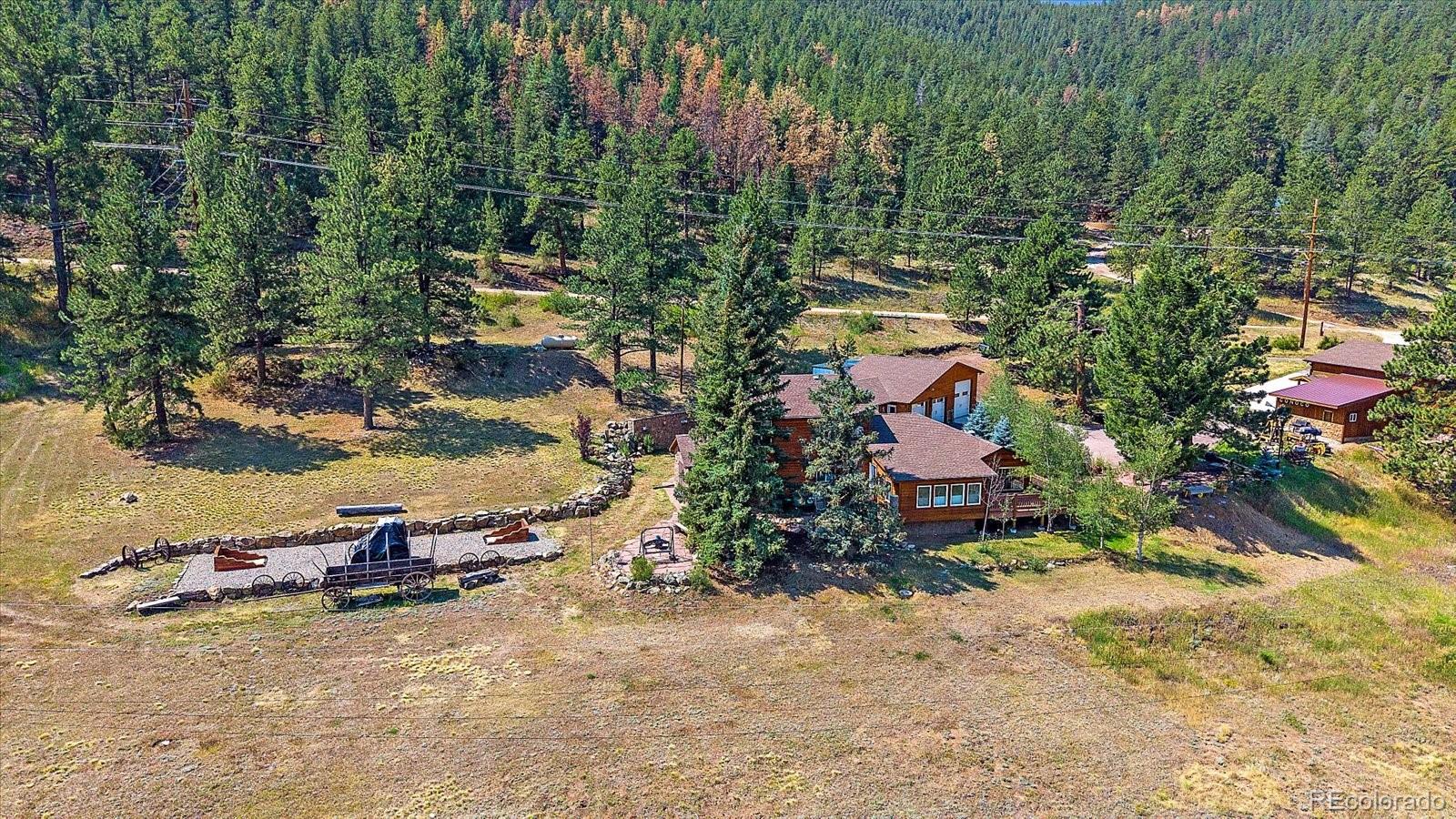 357 County Road 64 Shawnee, CO 80475 - Photo 33 of 50 an aerial view of a house with a yard and lake view