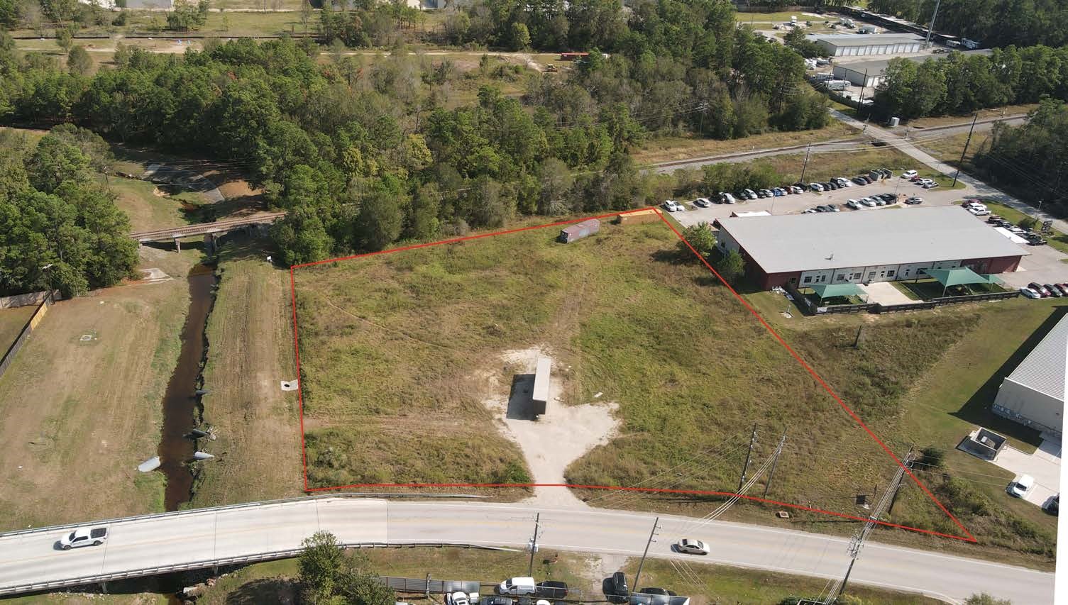 0 Hanna Road Spring, TX 77386 - Photo 2 of 6 an aerial view of a house with a yard
