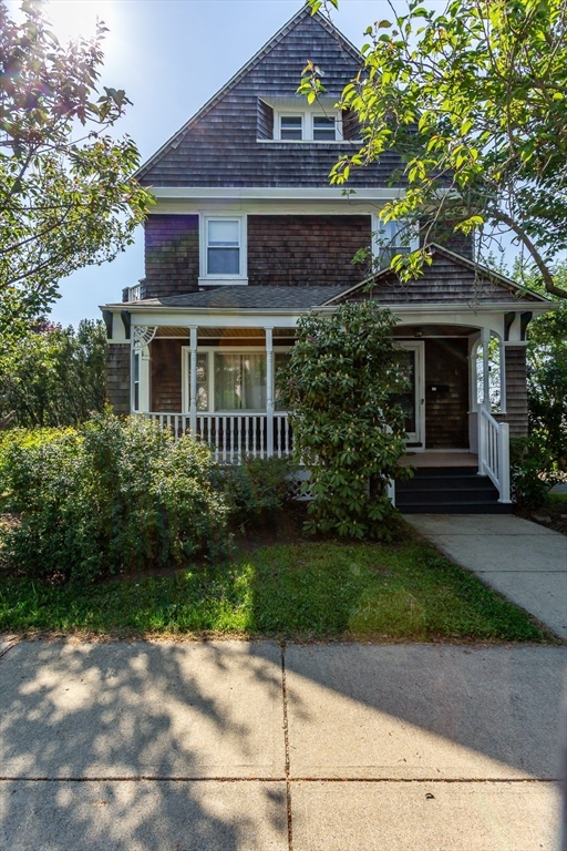 724 High Street Fall River, MA 02720 - Photo 1 of 39 a front view of a house with a garden