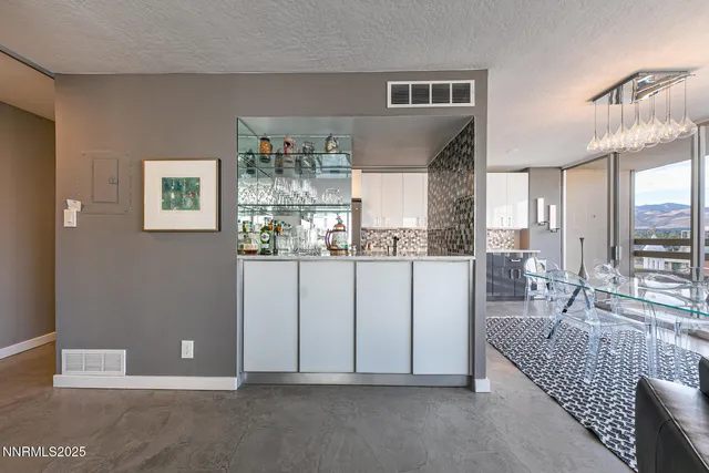 a view of kitchen with furniture and window
