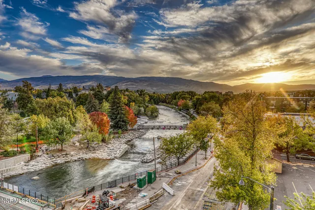 a view of a swimming pool with an outdoor seating