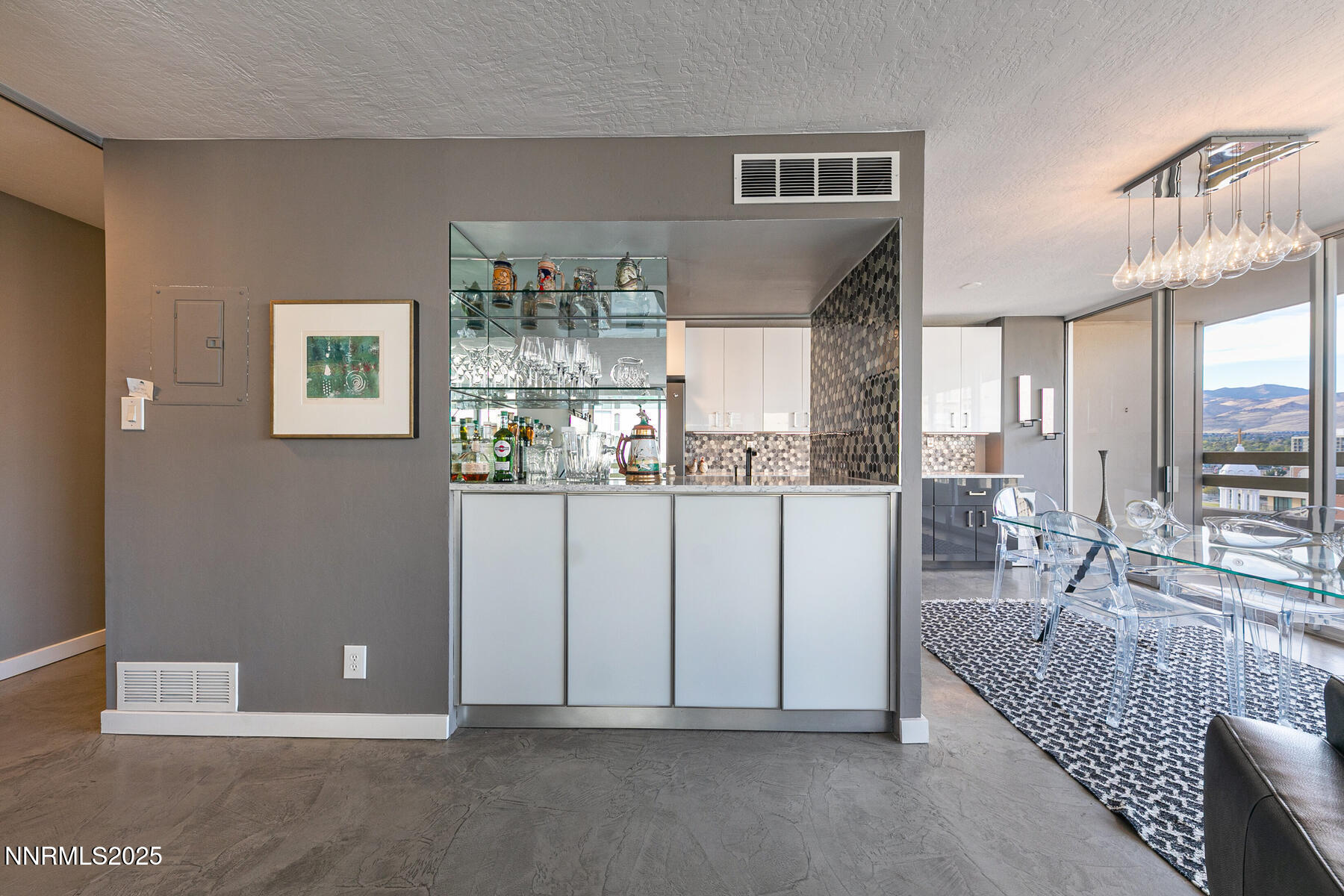 100 North Arlington Avenue, Unit 7K Reno, NV 89501 - Photo 9 of 28 a view of kitchen with furniture and window