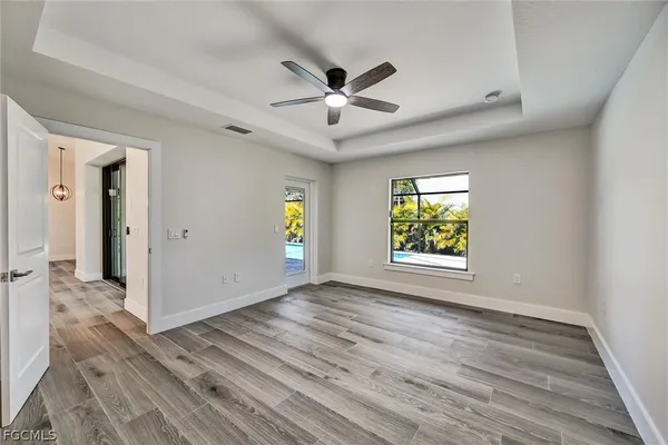a bathroom with a double vanity sink a mirror and shower