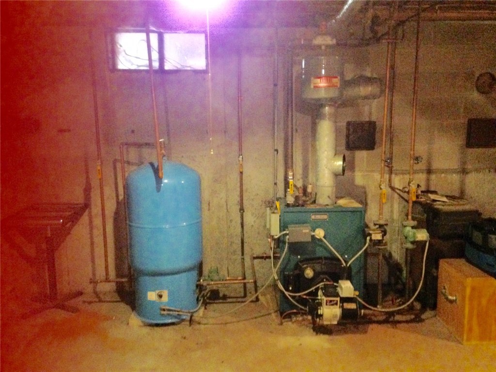 247 Nicholas Road Coventry, RI 02827 - Photo 34 of 34 HEATING SYSTEN AND HOT WATER TANK