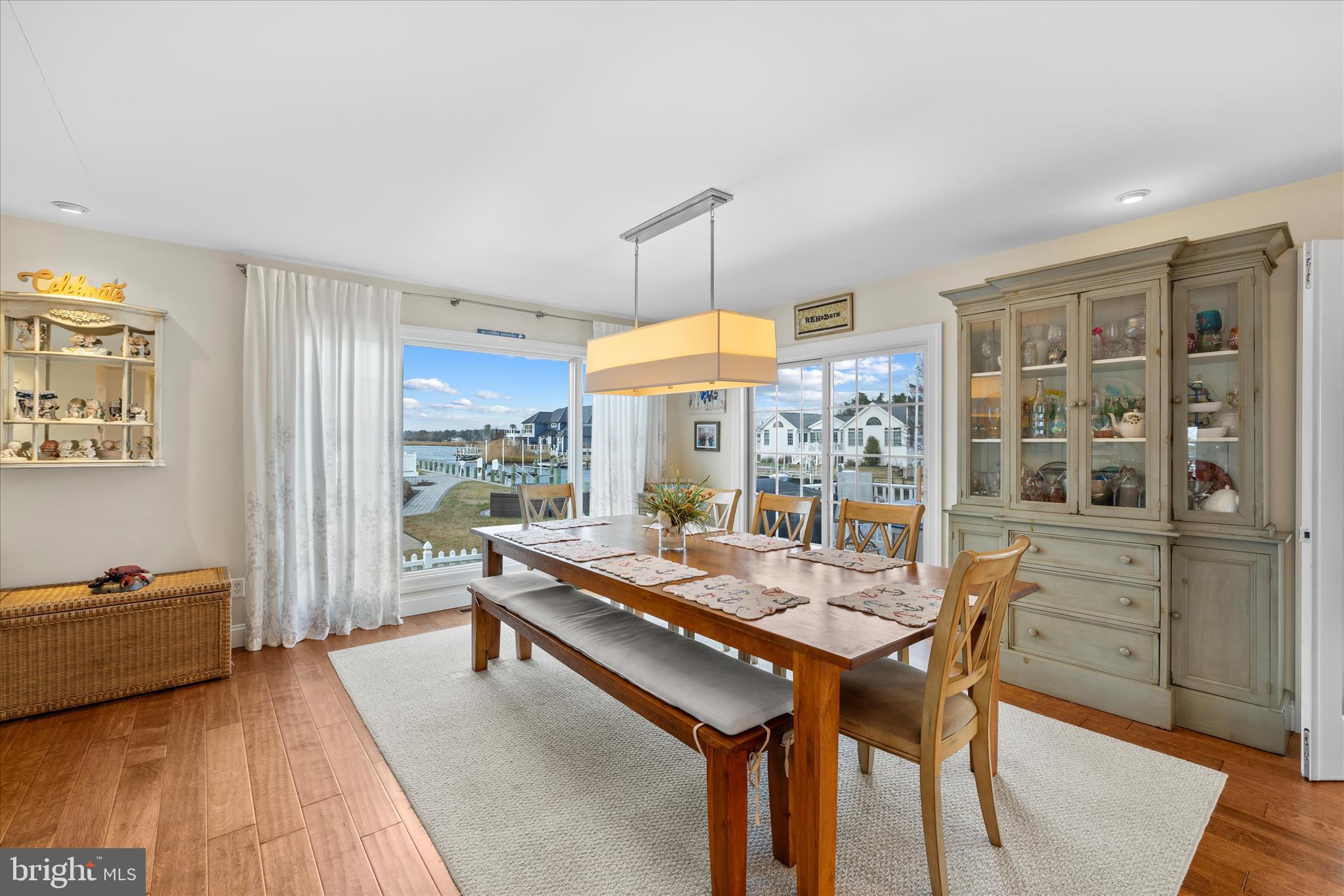 30 Marshall Road Rehoboth Beach, DE 19971 - Photo 16 of 77 a room with a table chairs and a wooden floor