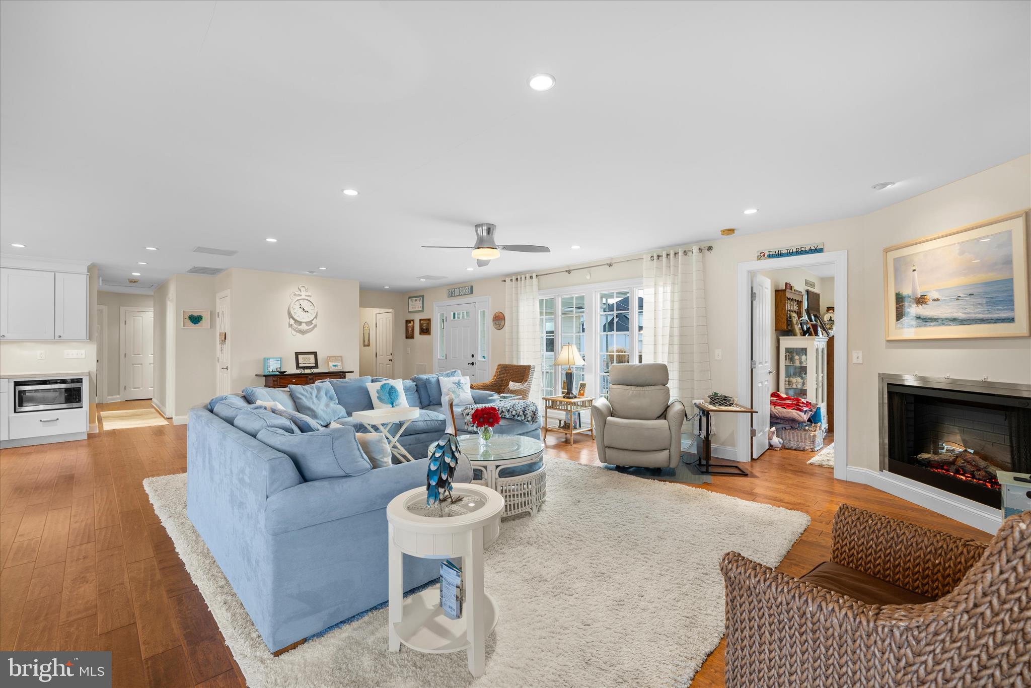 30 Marshall Road Rehoboth Beach, DE 19971 - Photo 17 of 77 a living room with furniture and a fireplace