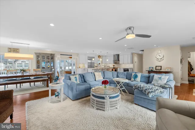 a bedroom with a bed and a dresser in it