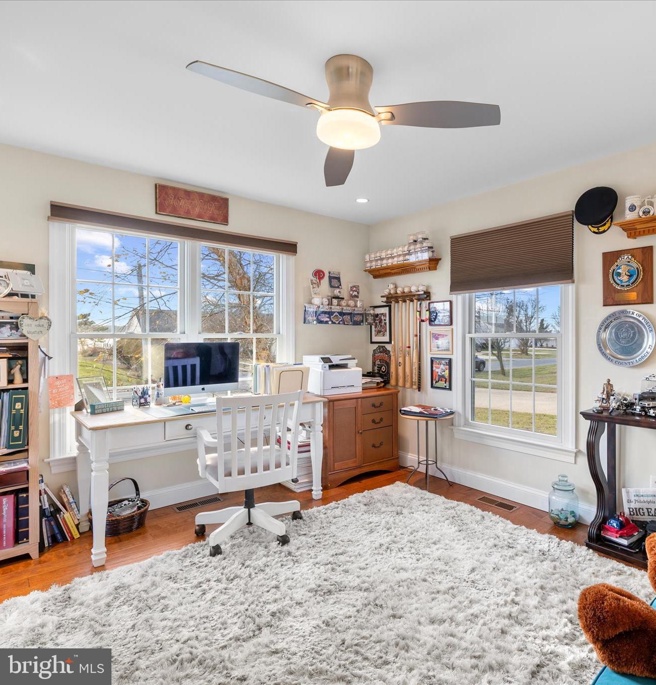 30 Marshall Road Rehoboth Beach, DE 19971 - Photo 21 of 77 a living room with furniture and a flat screen tv