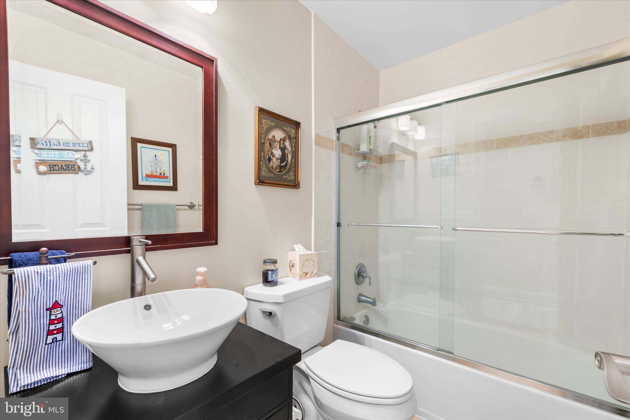 30 Marshall Road Rehoboth Beach, DE 19971 - Photo 23 of 77 a bathroom with a sink toilet and shower