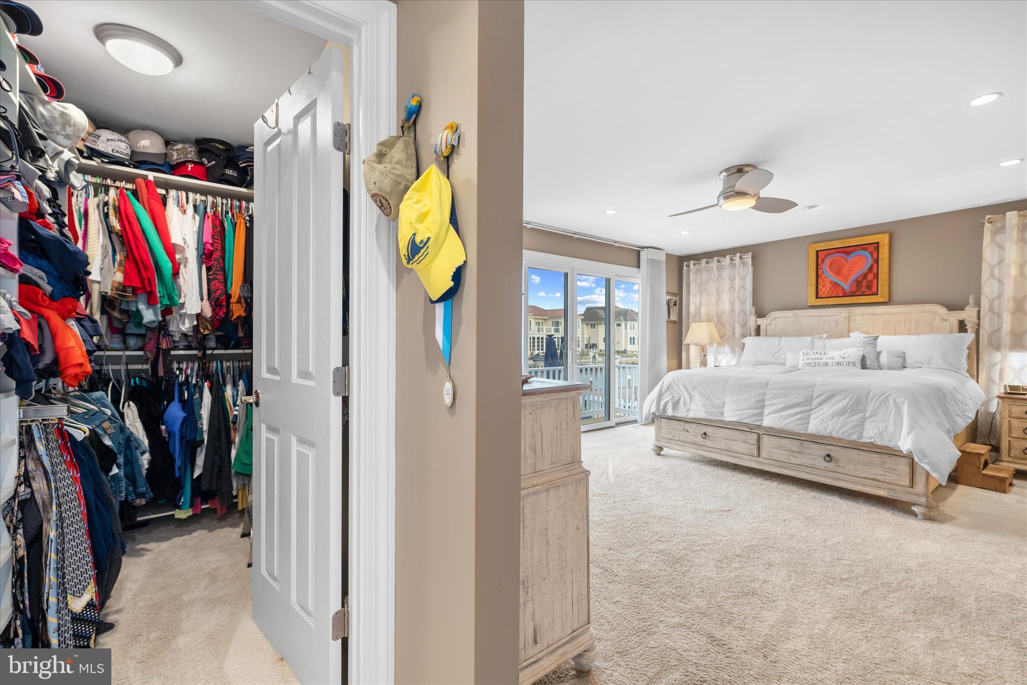 30 Marshall Road Rehoboth Beach, DE 19971 - Photo 27 of 77 a spacious bedroom with a bed and a walk in closet