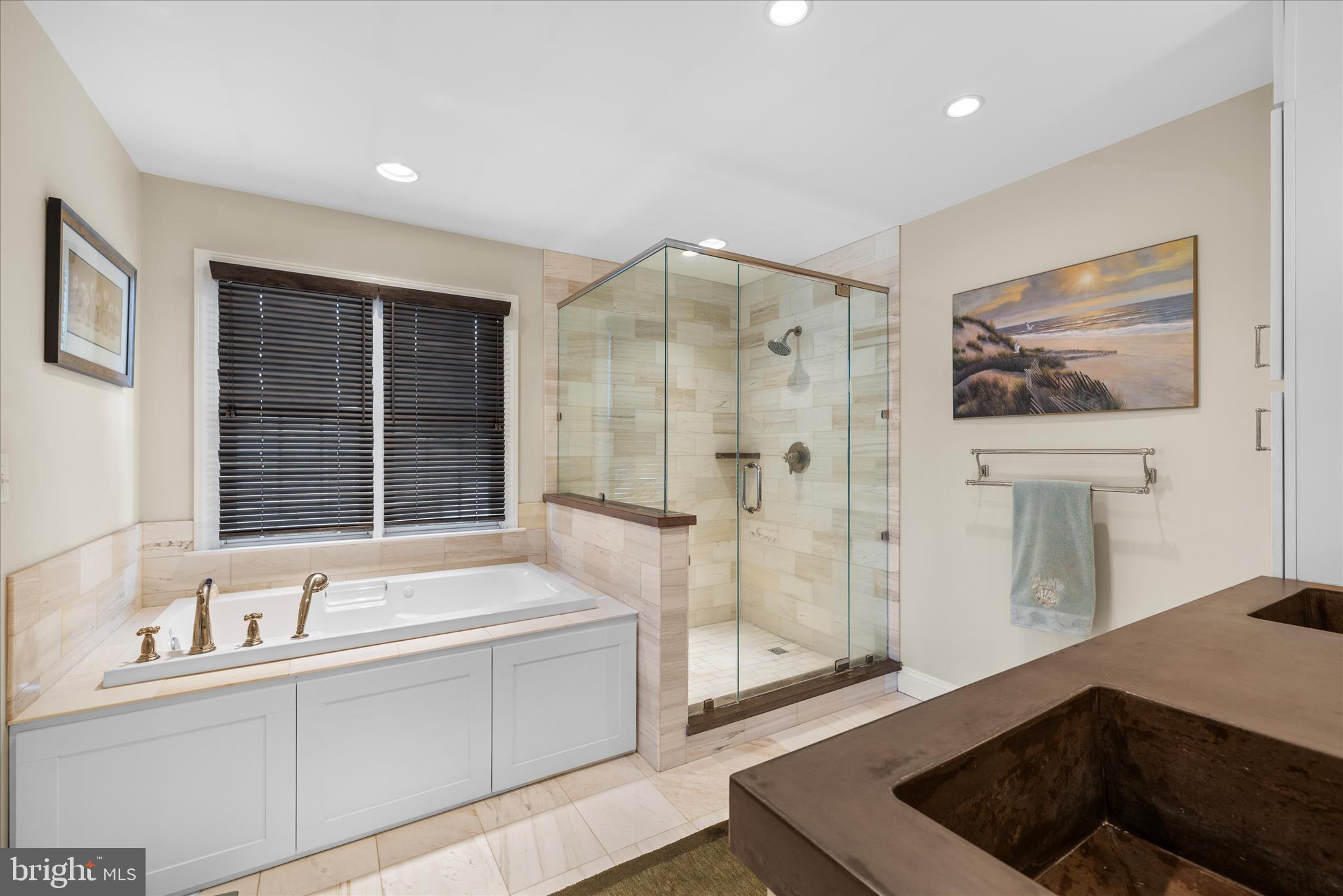 30 Marshall Road Rehoboth Beach, DE 19971 - Photo 33 of 77 a bathroom with a tub sink and mirror