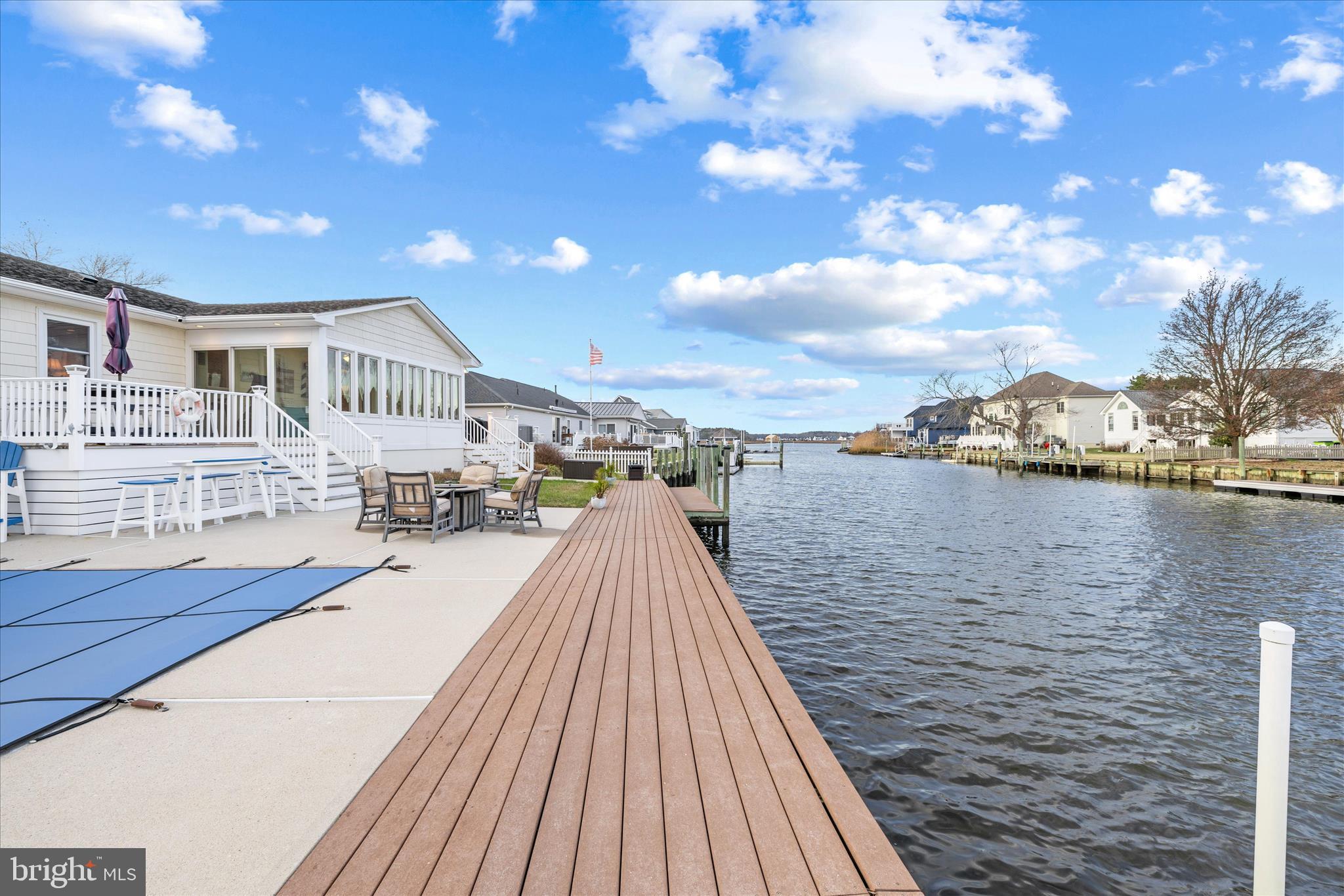 30 Marshall Road Rehoboth Beach, DE 19971 - Photo 49 of 77 a view of balcony with seating space and wooden floor