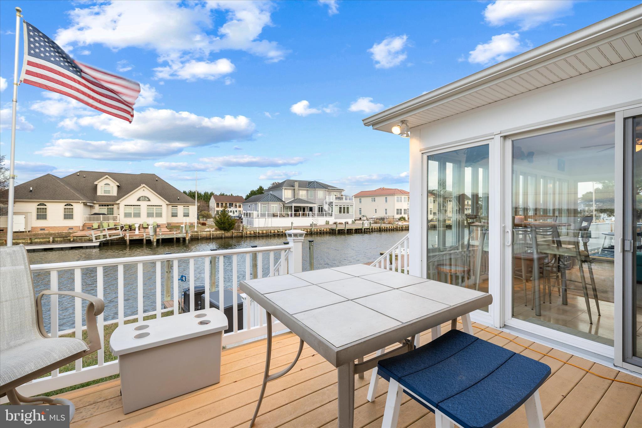 30 Marshall Road Rehoboth Beach, DE 19971 - Photo 53 of 77 a view of a balcony with wooden floor and outdoor seating