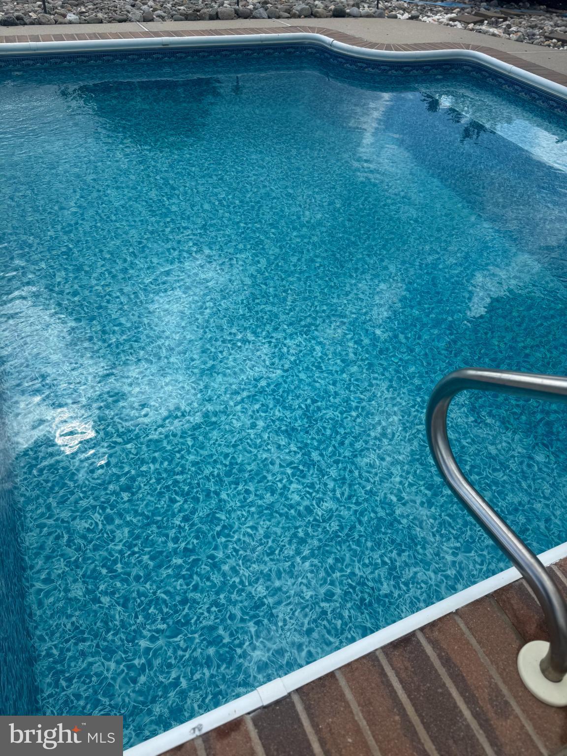 30 Marshall Road Rehoboth Beach, DE 19971 - Photo 70 of 77 a view of a floor to ceiling window and a wooden fence