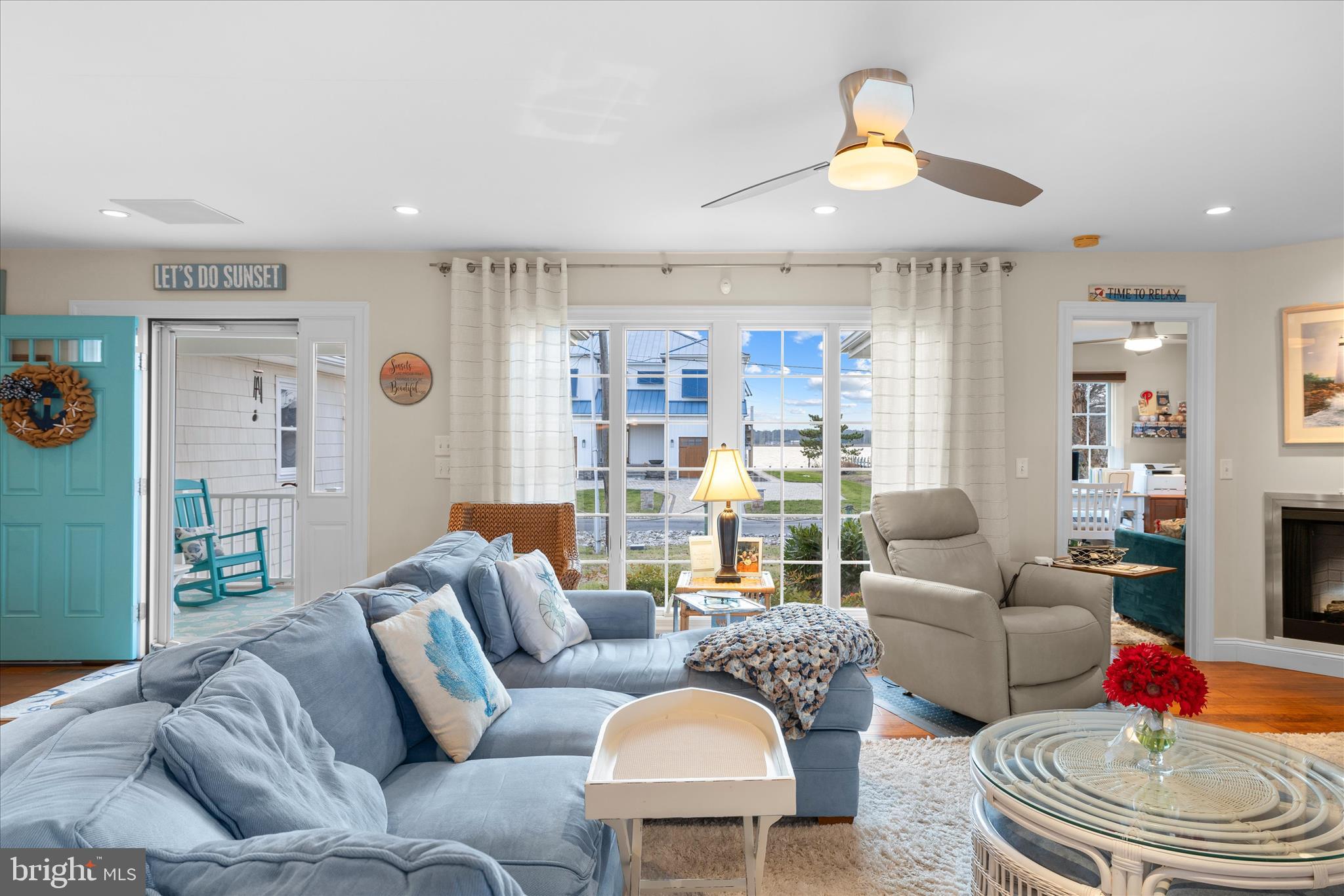 30 Marshall Road Rehoboth Beach, DE 19971 - Photo 8 of 77 a living room with furniture and a chandelier