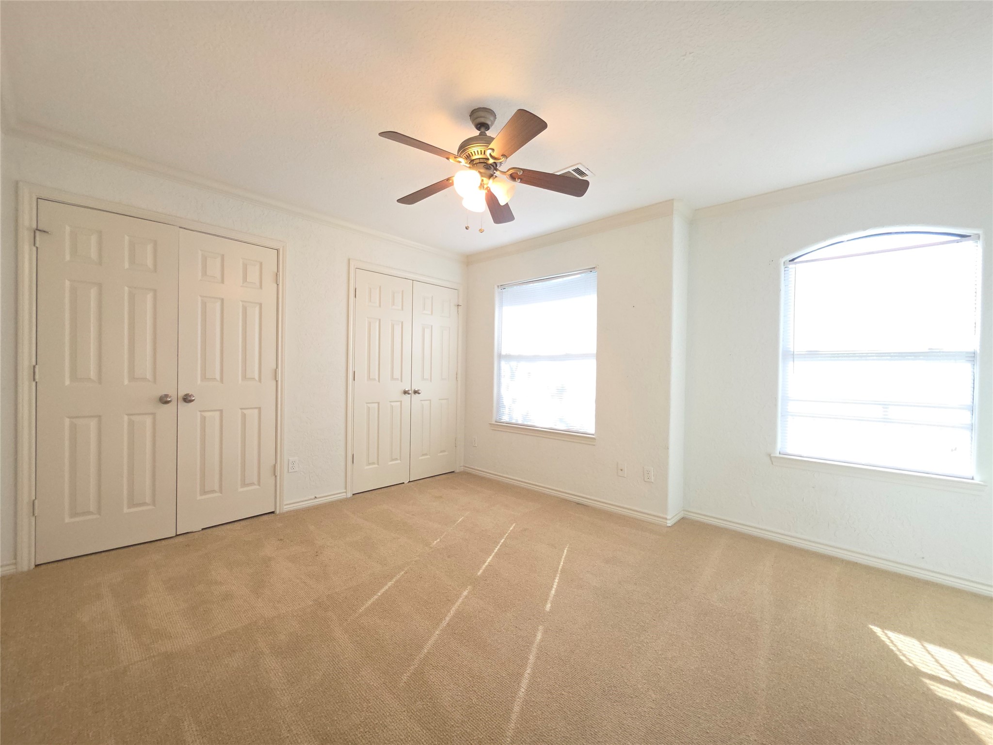 1898 Longmire Road, Unit 8 Conroe, TX 77304 - Photo 13 of 17 a view of an empty room with a window