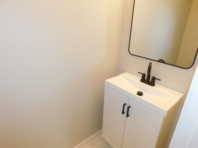 1834 Stephens Pond View Loganville, GA 30052 - Photo 11 of 25 a bathroom with a sink and mirror