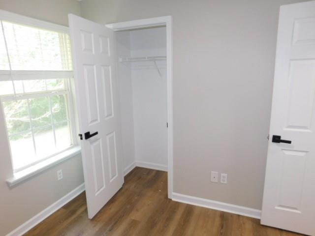 1834 Stephens Pond View Loganville, GA 30052 - Photo 19 of 25 a view of entryway with wooden floor