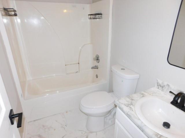 1834 Stephens Pond View Loganville, GA 30052 - Photo 20 of 25 a white toilet sitting next to a bath tub