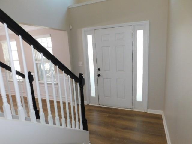 1834 Stephens Pond View Loganville, GA 30052 - Photo 2 of 25 a view of staircase with railing and white walls