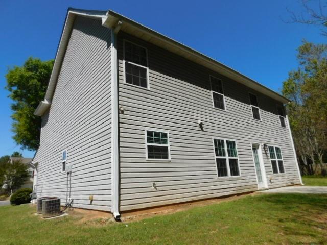 1834 Stephens Pond View Loganville, GA 30052 - Photo 25 of 25 a view of a house with a yard