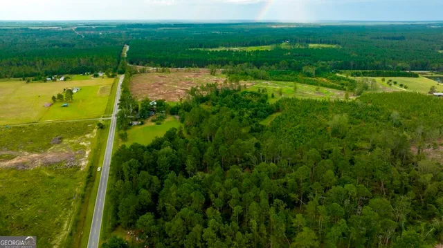 a view of a garden from a lake view