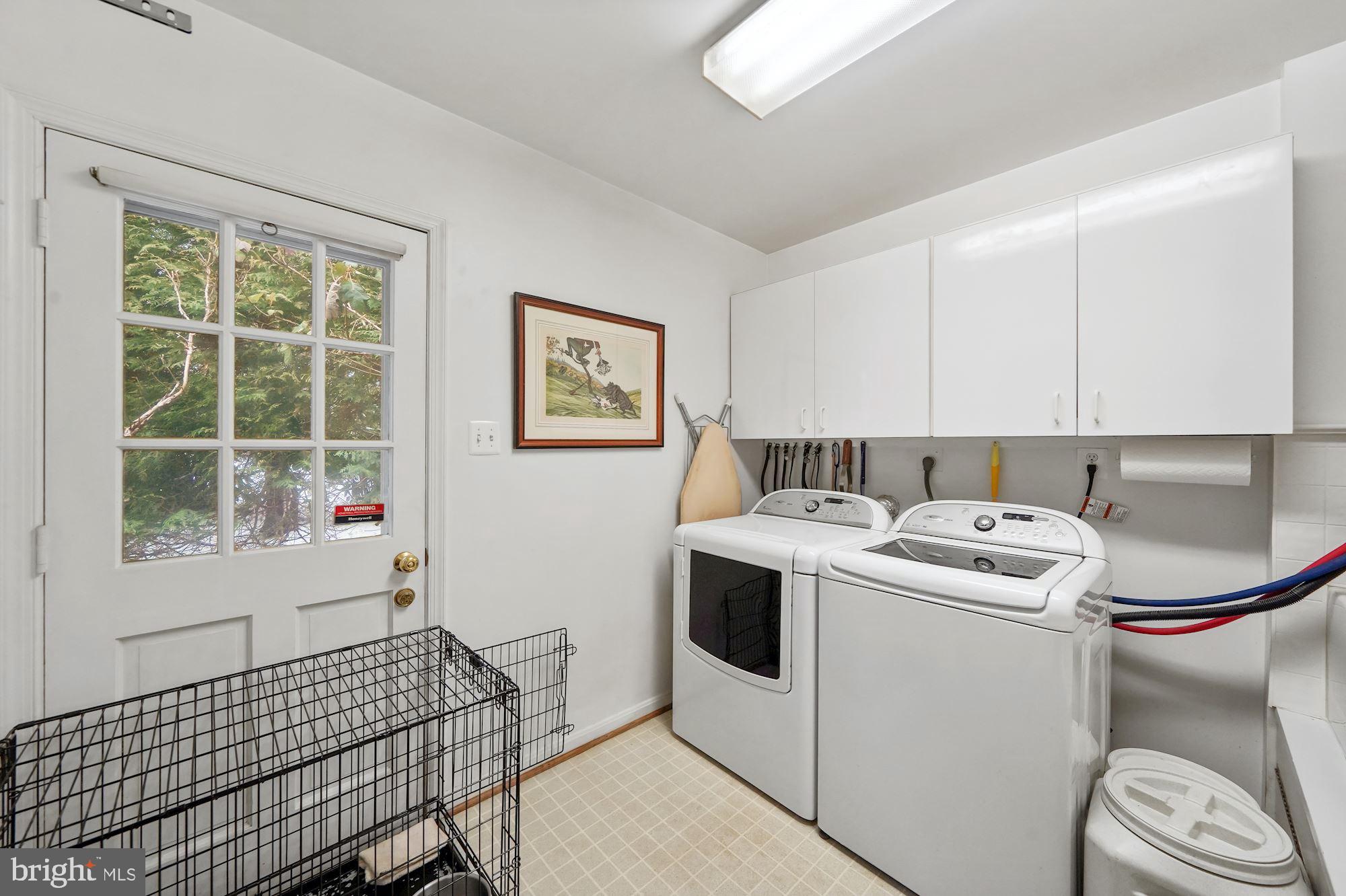5601 Little Falls Road Arlington, VA 22207 - Photo 15 of 38 Laundry/Mud Room w/ half bath off 2 car garage