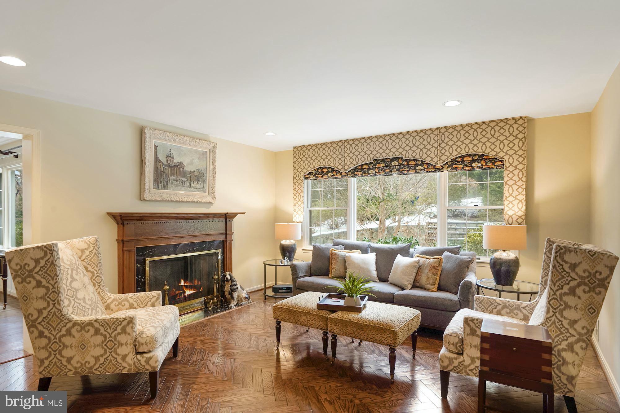 5601 Little Falls Road Arlington, VA 22207 - Photo 8 of 38 Family Room with wood burning fireplace